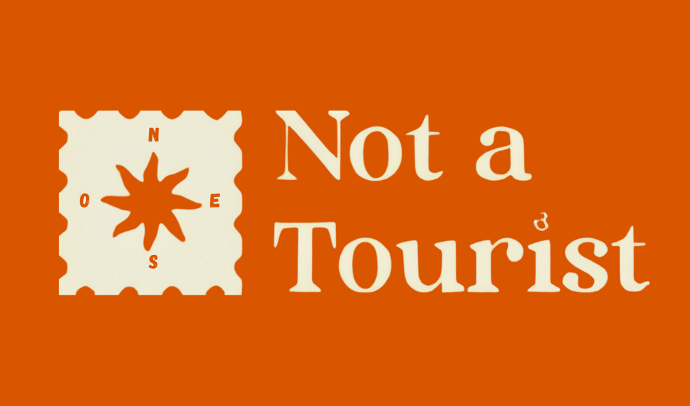 Not a Tourist Logo